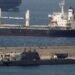 A British nuclear Astute-class submarine HMS Ambush (Bottom) is seen docked in a port while it is repaired after it was involved in a "glancing collision" with a merchant vessel off the coast of the peninsula of Gibraltar on Wednesday, in the British overseas territory of Gibraltar, July 21, 2016. REUTERS/Jon Nazca