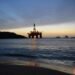 Transocean Beached Offshore Oil Rig during sunset