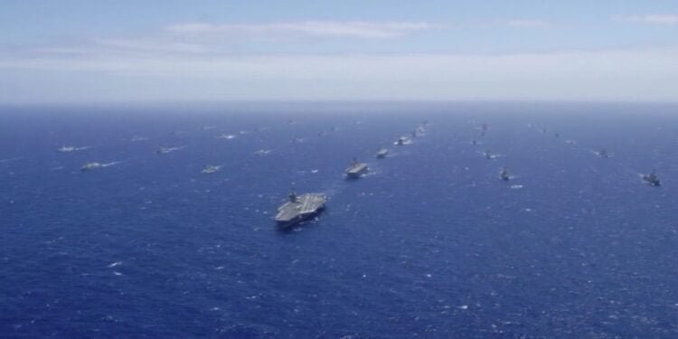Watch: Forty Ships and Submarines Sail in Close Formation