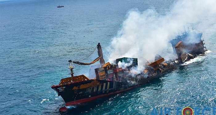 Burned out shell of containership seen from air