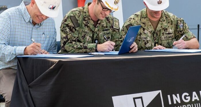 Signing ceremony for acceptance of first Flight III destroyer
