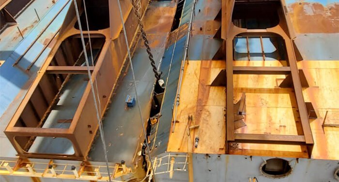 The cutting chain progresses along the pre-cut groove during operations to separate Section Three from the remaining Golden Ray wreck on Sunday. [