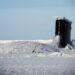 160317-N-QA919-091 ARCTIC CIRCLE (March 15, 2016) The Los Angeles-class fast attack submarine USS Hampton (SSN 757) surfaces at Ice Camp Sargo during Ice Exercise (ICEX) 2016. ICEX 2016 is a five-week exercise designed to research, test, and evaluate operational capabilities in the region. ICEX 2016 allows the U.S. Navy to assess operational readiness in the Arctic, increase experience in the region, advance understanding of the Arctic Environment, and develop partnerships and collaborative efforts. (U.S. Navy photo by Mass Communication Specialist 2nd Class Tyler Thompson)