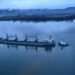 A tug helps stabilize the motor vessel Sparna, a 623-foot Panamanian-flagged bulk carrier, while the Sparna awaits repairs after it sustained damage below the waterline while transiting in the Columbia River near Cathlamet, Wash., March 21, 2016. The Sparna is loaded with grain and was headed west on the Columbia River when the incident occurred. (U.S. Coast Guard photo by Petty Officer 1st Class Levi Read)