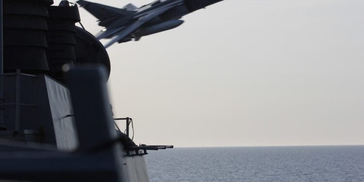 Watch How Incredibly Close Two Russian Fighter Jets Came to a U.S. Navy Destroyer
