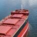bow of a dry bulk carrier at anchor