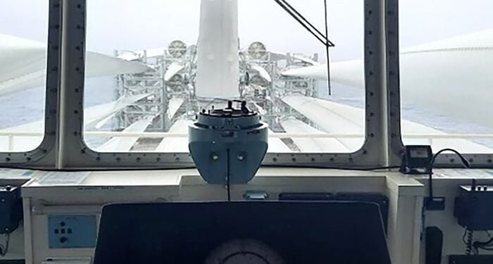 Photo showing navigation bridge visibility obscured by wind turbine component cargo