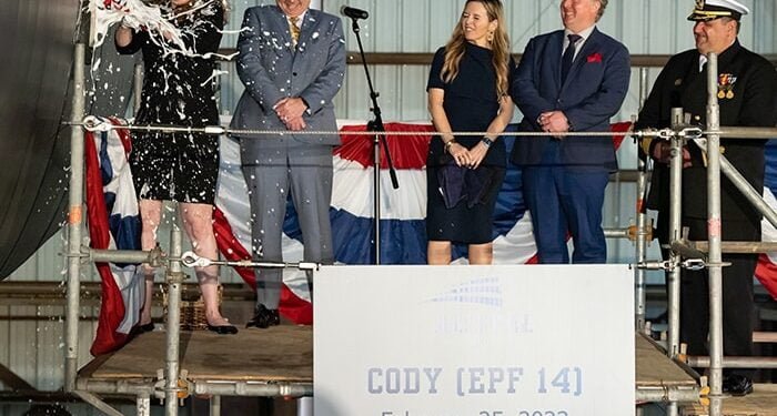 Expeditionary Fast Transport (EPF) USNS Cody was christened by sponsor Averil D. Spencer with a ceremonial champagne bottle-break on its bow.