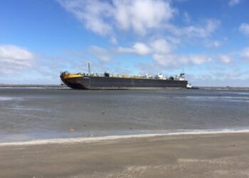 Tug and Barge Ground in High Winds Off Galveston, Texas