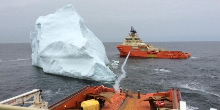 Tug Towing Iceberg