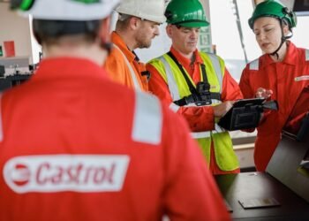 Castrol people in Castrol hats